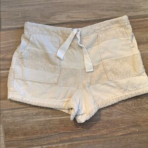 Sunday terry cloth shorts with string tie- cream. One size‎